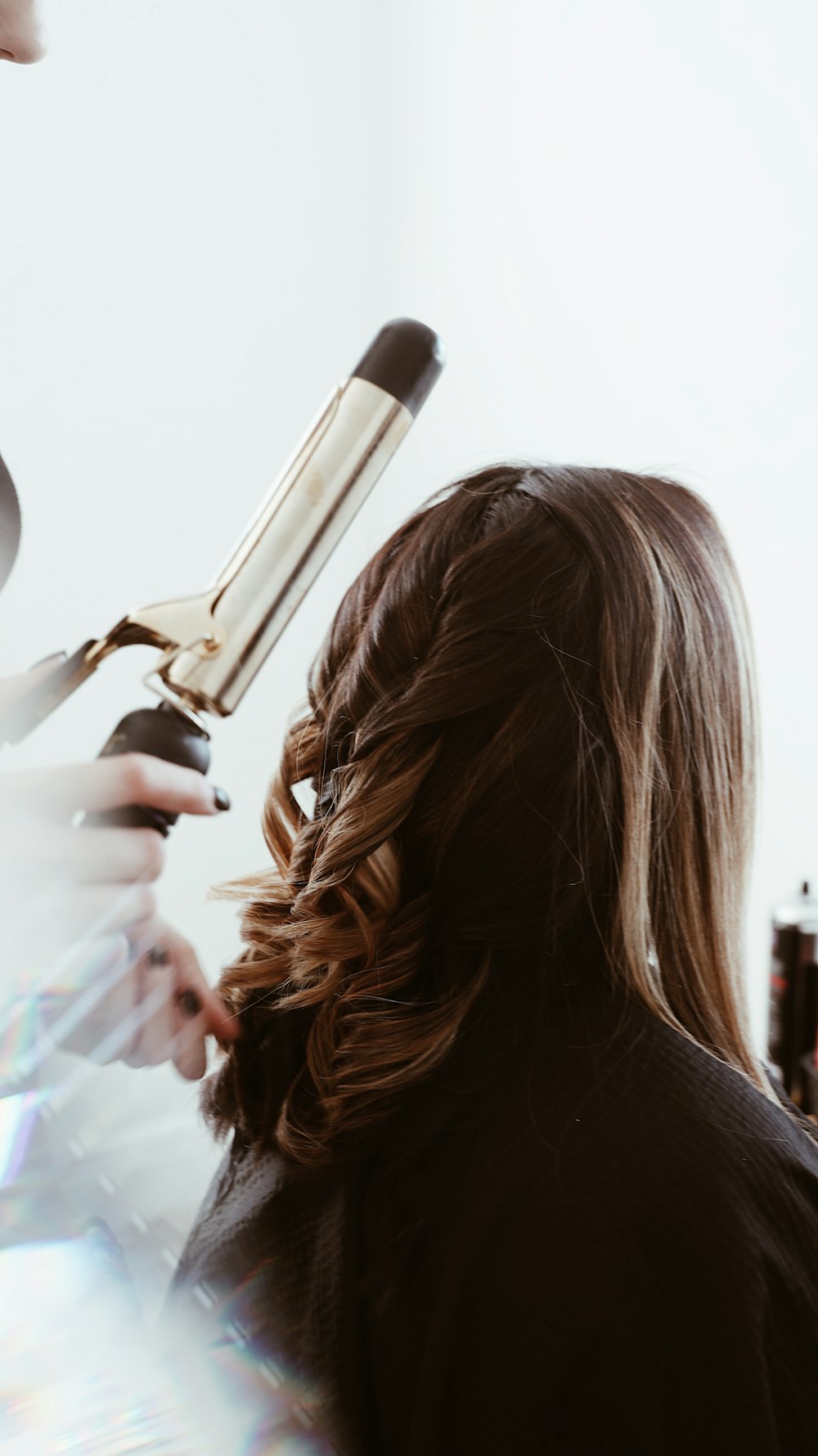 Hair styling with curling iron